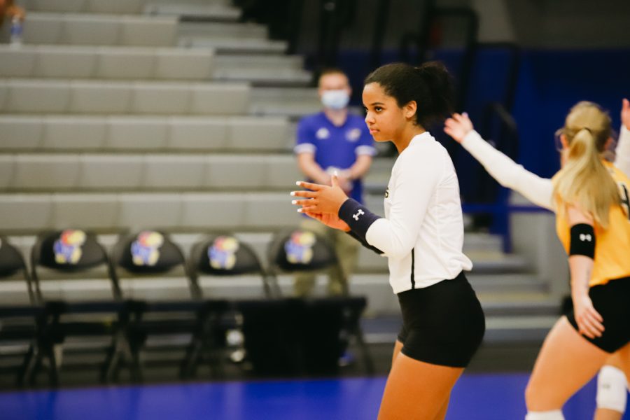 Freshmen Kailin Newsome claps during the game against Kent State University on Sep 10 at Horejsi Family Volleyball Center.