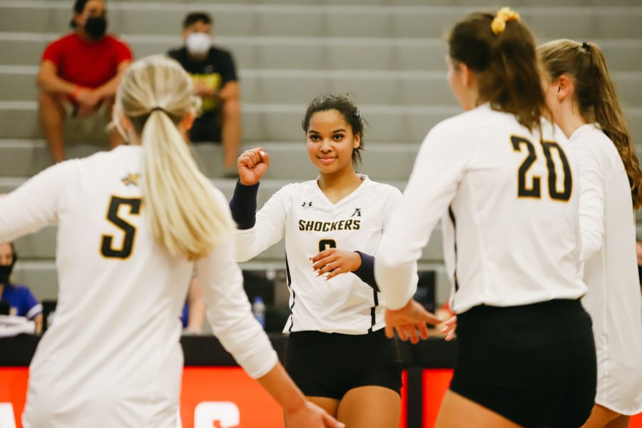 Freshmen Kailin Newsome celebrates during the game against Kent State University on Sep 10 at Horejsi Family Volleyball Center.