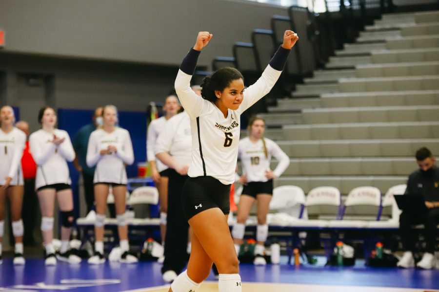 Freshmen Kailin Newsome celebrates during the game against Kent State University on Sep 10 at Horejsi Family Volleyball Center.