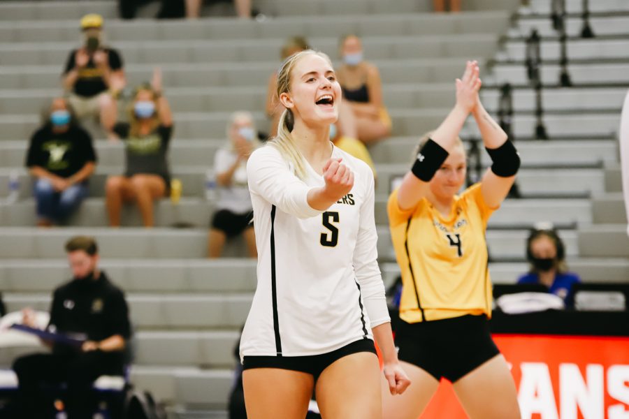 Sophomore Kayce Litzau celebrates during the game against Kent State University on Sep 10 at Horejsi Family Volleyball Center.