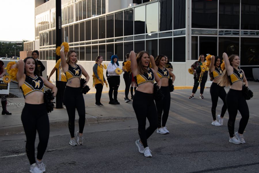 Wichita State Cheerleaders performing at the Riverfest reverse parade on Oct. 1, 2021.