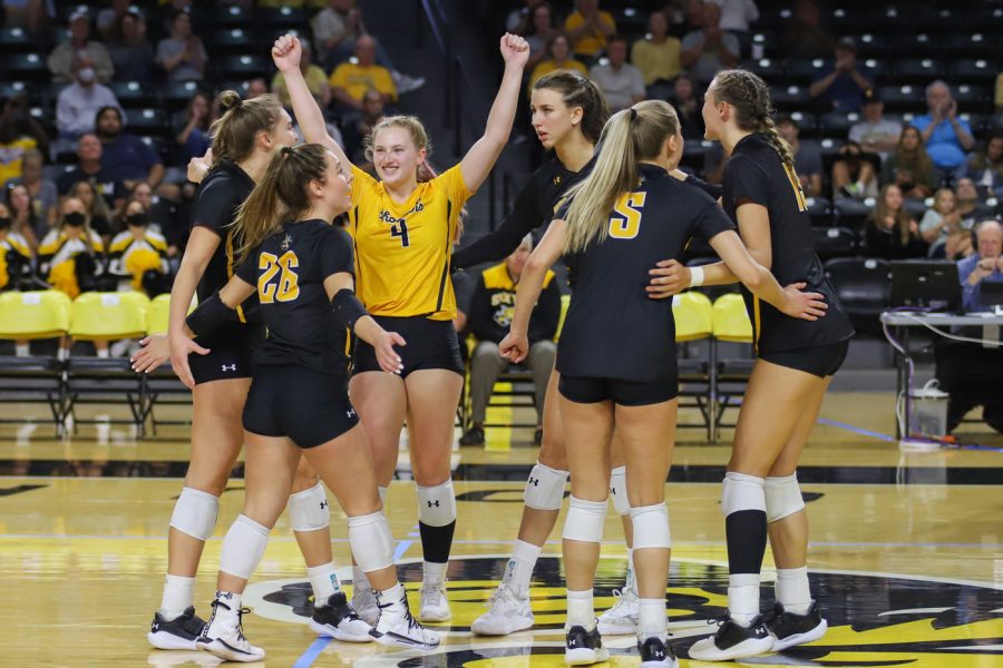 The+Shockers+celebrate+after+scoring+a+point+against+Southern+Florida+on+Oct.+3+at+the+Charles+Koch+Arena.
