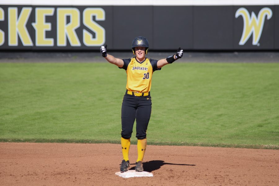 Sophomore Addison Barnard celebrates after hitting a double against Fort Hays on Oct. 17 in Wilkins Stadium.