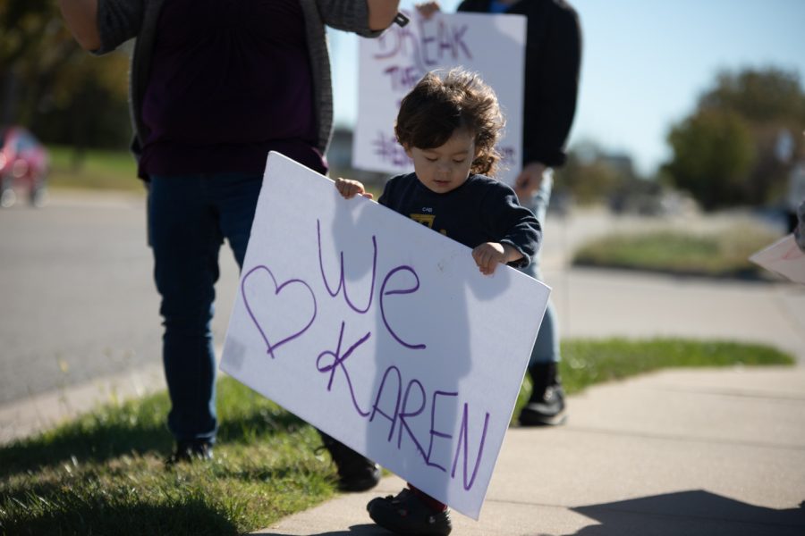 Child of Kristen Gowell shows fighting for what you believe in can begin at any age. The young boy danced and yelled as he supported Professor Countryman-Roswurm outside of the Mextroplex on Oct. 29.