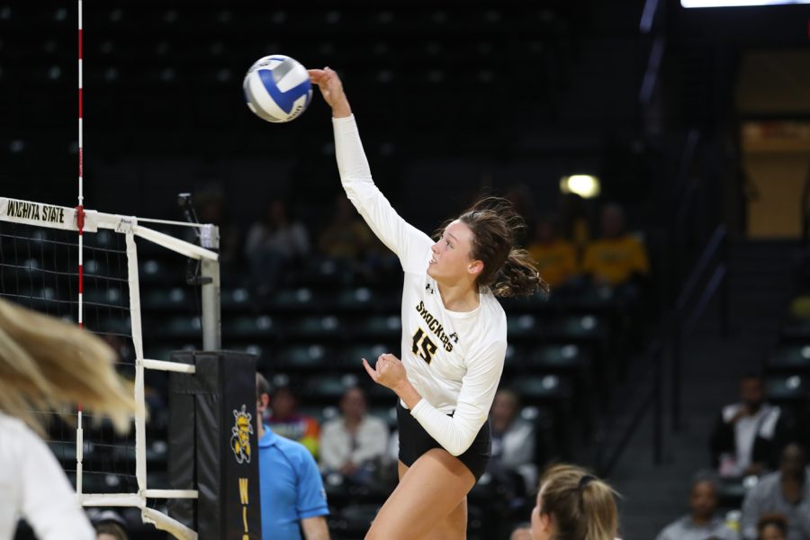 Freshman Morgan Stout goes up for a spike during the game against SMU at Charles Koch Arena on Nov. 25.