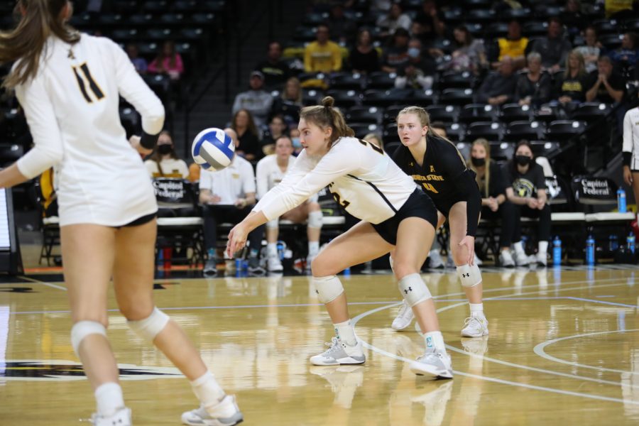 Freshman Morgan Weber digs the ball during the game against SMU at Charles Koch Arena on Nov. 25.