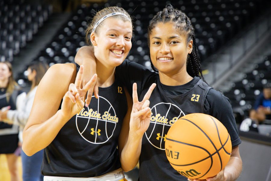Junior Carla Bremaud and Junior Seraphine Bastin pose on media day at the Charles Koch Arena on Oct. 13, 2021.