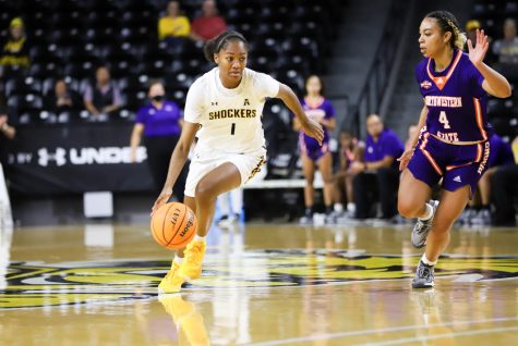 DJ McCarty drives the ball towards the basket during the game against Northwestern State on Nov. 29 inside Charles Koch Arena.