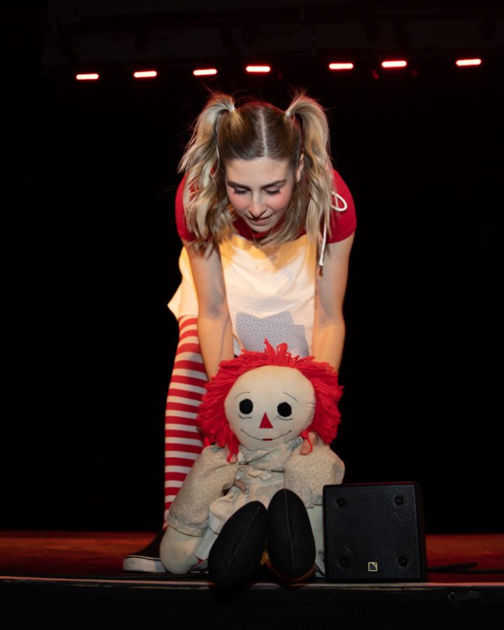 Maizy Sutherland of Delta Gamma puts down a doll during their Songfest performance on Nov 7 at the Orpheum Theatre.
