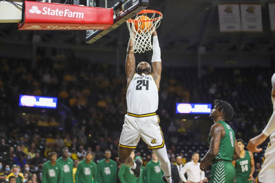 Junior Morris Udeze goes up for a dunk during an exhibition game against Missouri Southern State on Nov. 1 inside Charles Koch Arena.