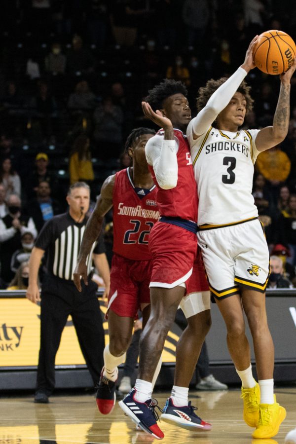 Junior Craig Porter Jr. looks to pass during the game against South Alabama at Chrles Koch Arena on Nov. 13.