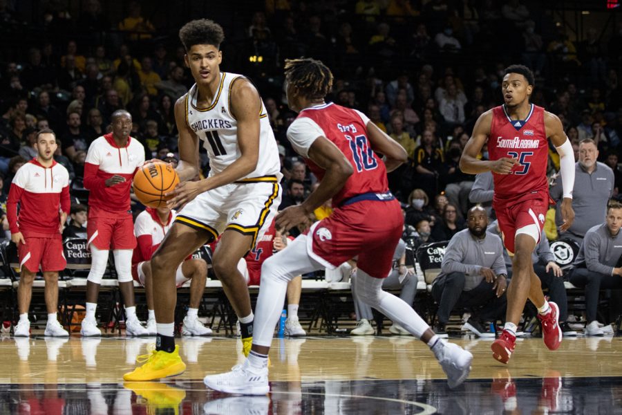 Freshman Kenny Pohto looks to pass the ball during the game against South Alabama in the Charles Koch Arena on Nov. 13.