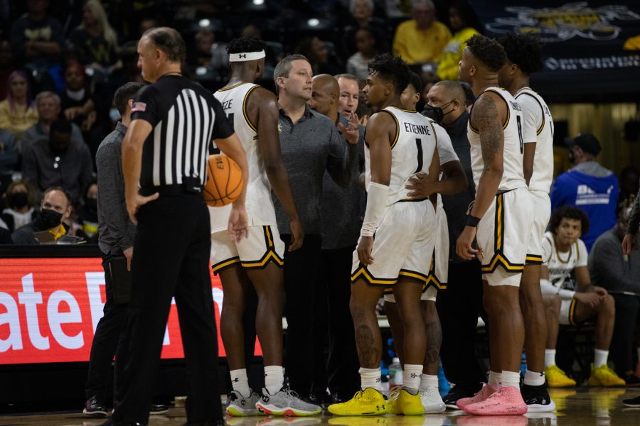 Associate head coach Lou Guidino talks to the team during a timeout in the 4th quarter against South Alabama at the Charles Koch Arena on Nov. 13.