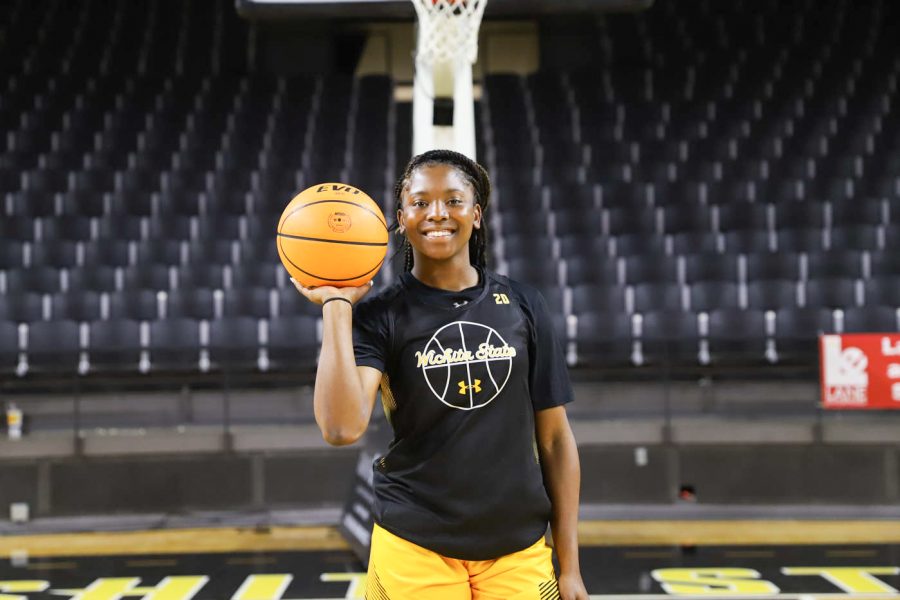 Freshman Shamaryah Duncan poses for a photo during media day on Oct. 13 inside Charles Koch Arena.