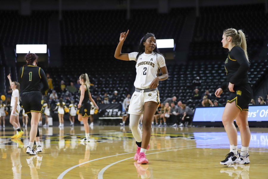 Mariah McCully celebrates after the exhibition game victory against Missouri Southern State on Nov. 4 inside Charles Koch Arena.