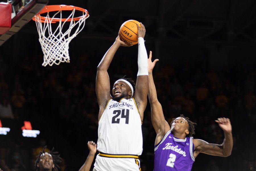 Morris Udeze looks to dunk the ball during the game against Tarleton State on Nov. 16 inside Charles Koch Arena.