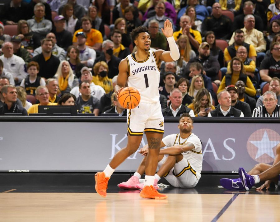 Sophomore Tyson Etienne calls out a play during the game against Kansas State on Dec. 5 inside INTRUST Bank Arena.