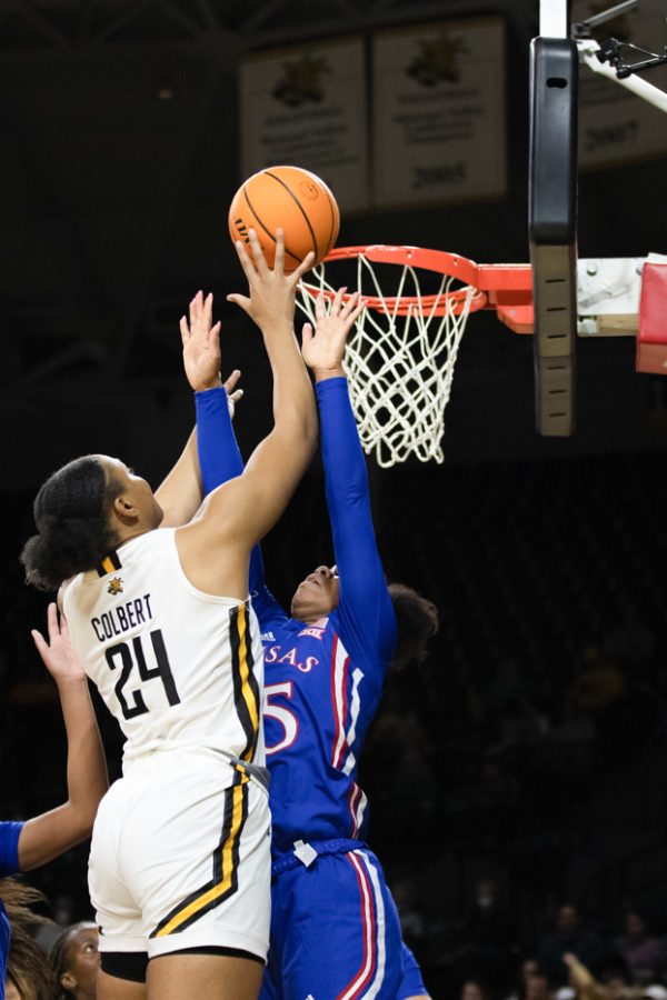 Junior Trajata Colbert shoots during the game against KU at Charles Koch Arena on Dec. 21.