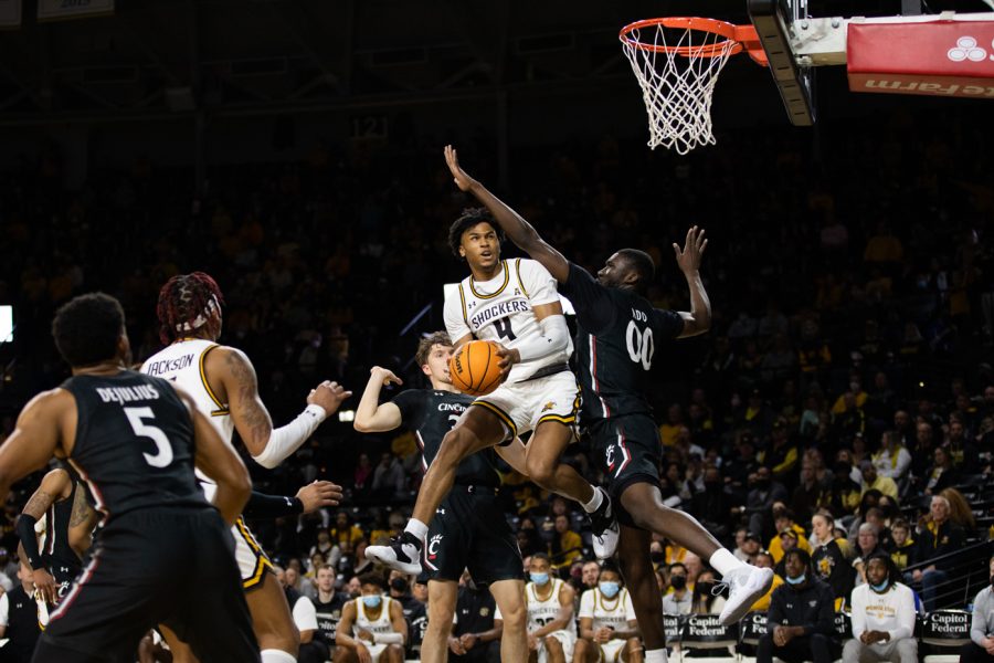 Freshman Ricky Council IV leaps up in attempt to make a two-pointer on Cincinatti on Jan. 16. Cincinnati upset Wichita State, 61-57.