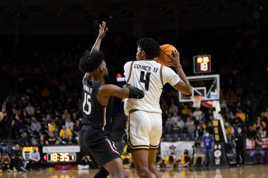 Freshman Ricky Council IV looks for a teammate to pass the ball to on Jan. 16 in Koch Arena.