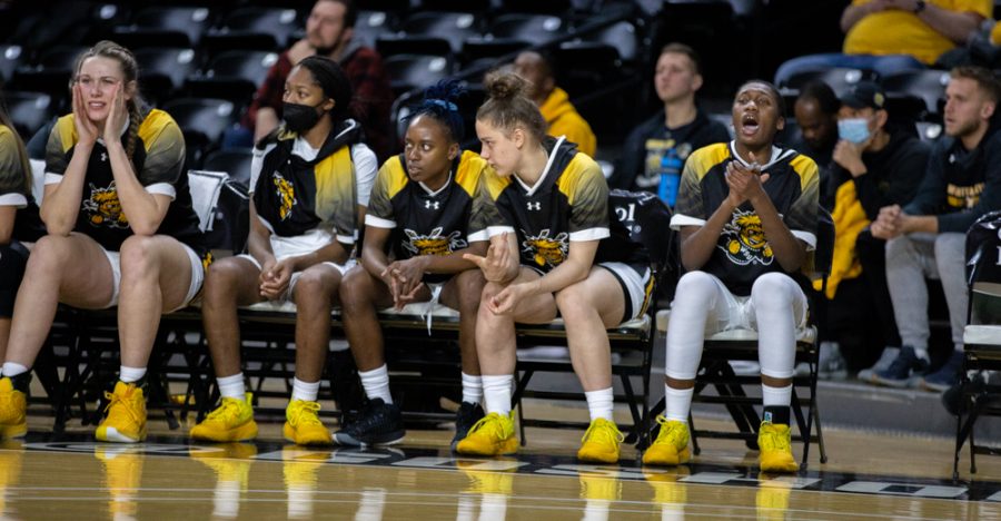 Wichita State womens basketball teamates watches from the side lines during the game against Houston at Charles Koch Arena on Jan. 5.