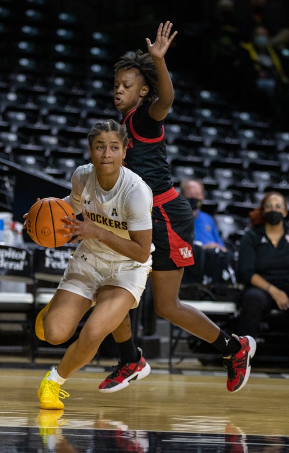 Junior Seraphine Bastin Dribbles down the court during the game against Houston at Charles Koch Arena on Jan. 5.