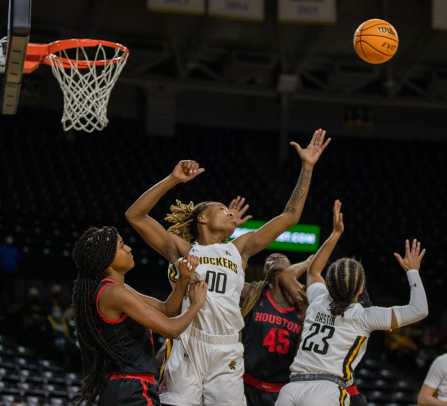 Senior Aisa Strong tries to go for a rebound  during the game against Houston at Charles Koch Arena on Jan. 5.