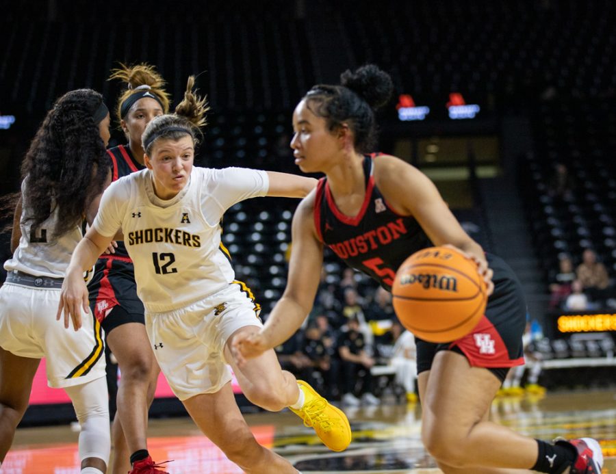 Freshman Carla Bremaud tries to intersept the ball during the game against Houston at Charles Koch Arena on Jan. 5.