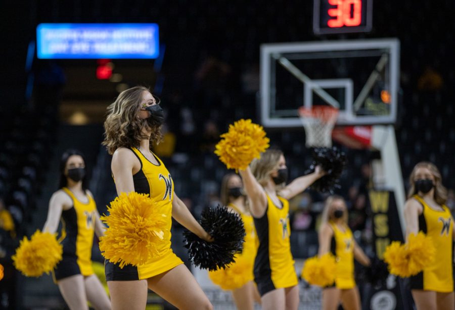 Wichita State cheer team cheers on the womens shockers basketball team during the game against Houston at Charles Koch Arena on Jan. 5.