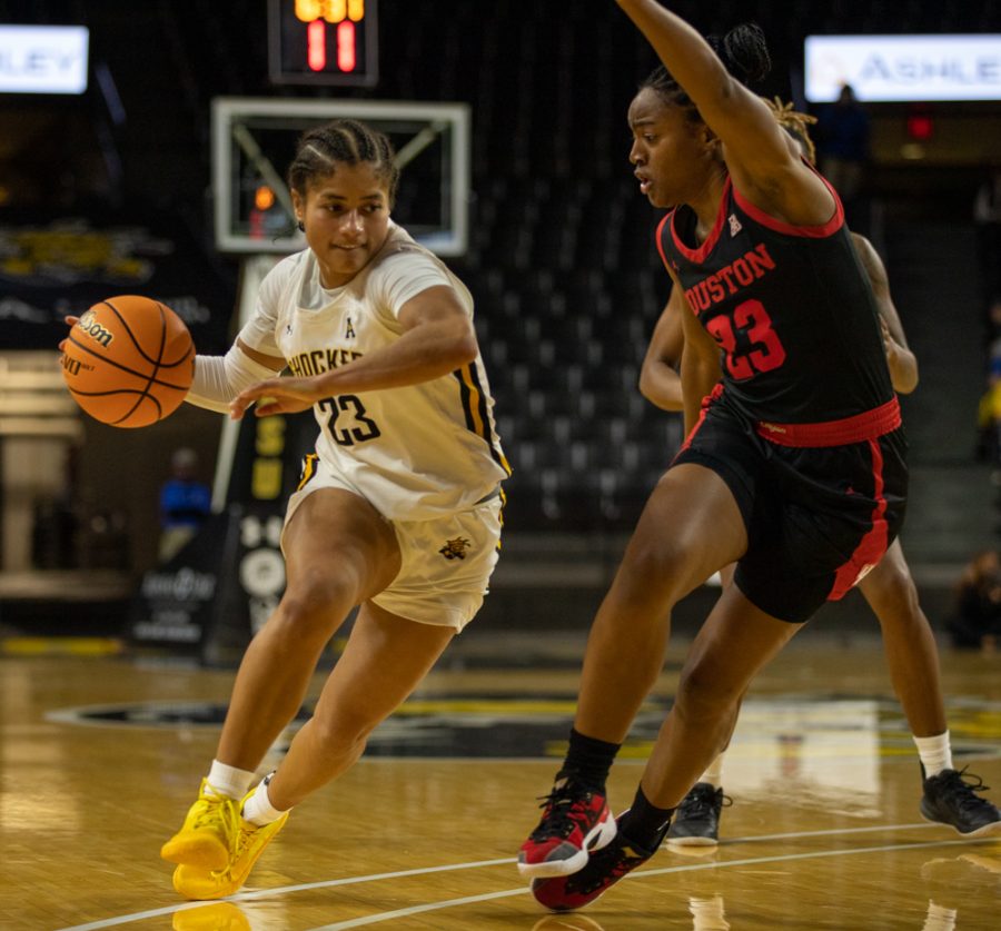 Junior Seraphine Bastin dribbles past a Houston player during the game against Houston at Charles Koch Arena on Jan. 5.