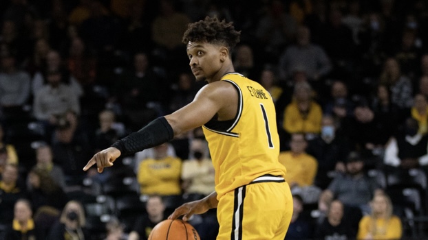 Tyson Etienne looks to drive the ball down the court during the game against UCF. Etienne attempted four rebounds on Jan. 26 in the Charles Koch Arena.