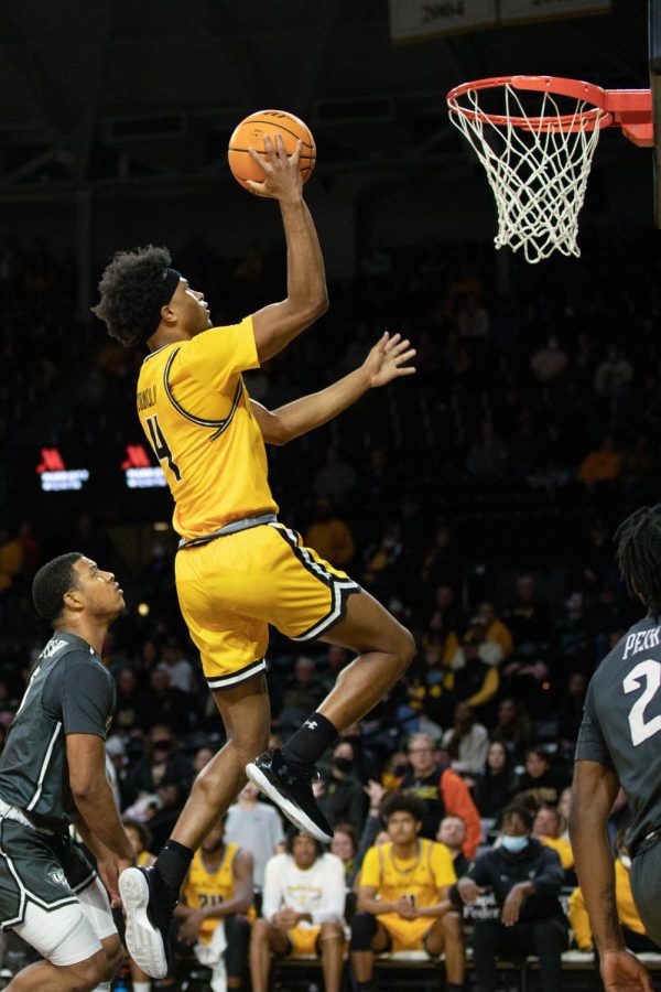 Freshman guard Ricky Council makes a jump shot against UCF in the Charles Koch Arena. Council went 6-10 in field goal attempts.