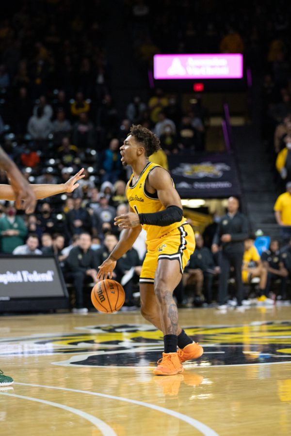 Sophomore Tyson Etienne calls out a play during the game against Tulane on Jan. 12. Etienne had three back-to-back three-pointers during the first seven minutes of the first half.