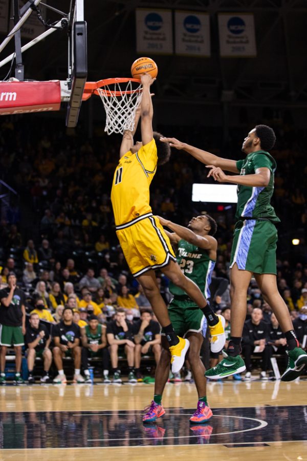 Freshman Kenny Pohto dunks the ball on Tulane on Jan. 12 in Koch Arena.