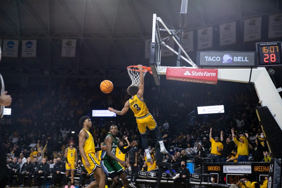 After stealing the ball from Tulane on Jan. 12, junior Craig Porter Jr. goes in for a lay-up and dunk.