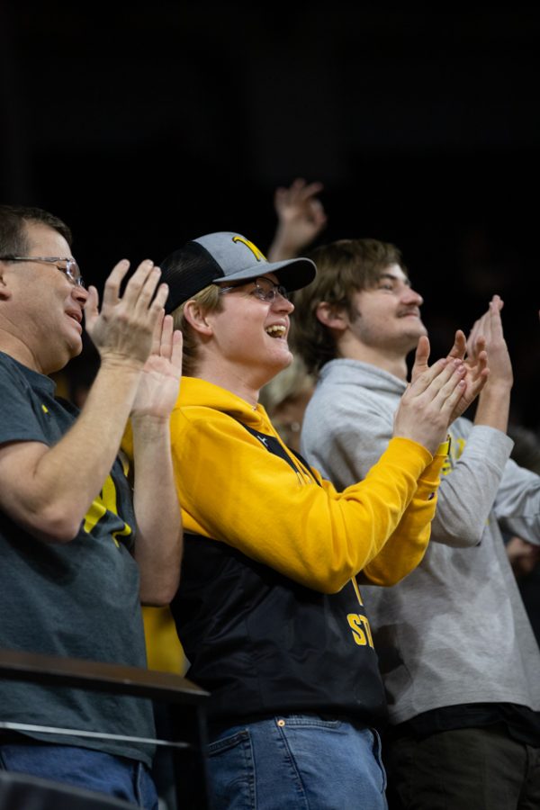 Shocker fans cheer on the mens basketball team as they stay ahead of Tulane in the first half of the game on Jan. 12.