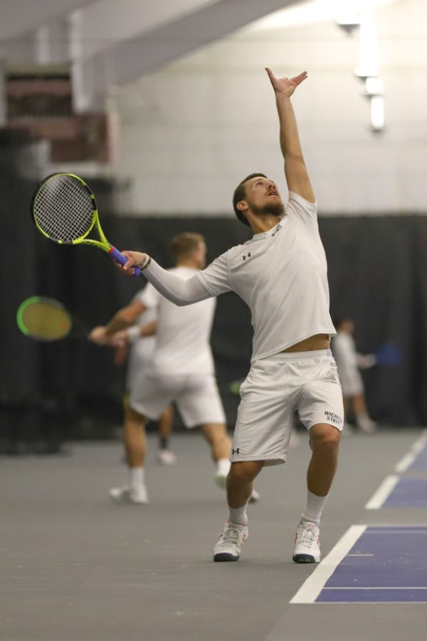 Junior Orel Ovil backhands the ball during his match against Purdue on Jan. 23. Ovil won his singles match against Milledge Cossu 2-0.