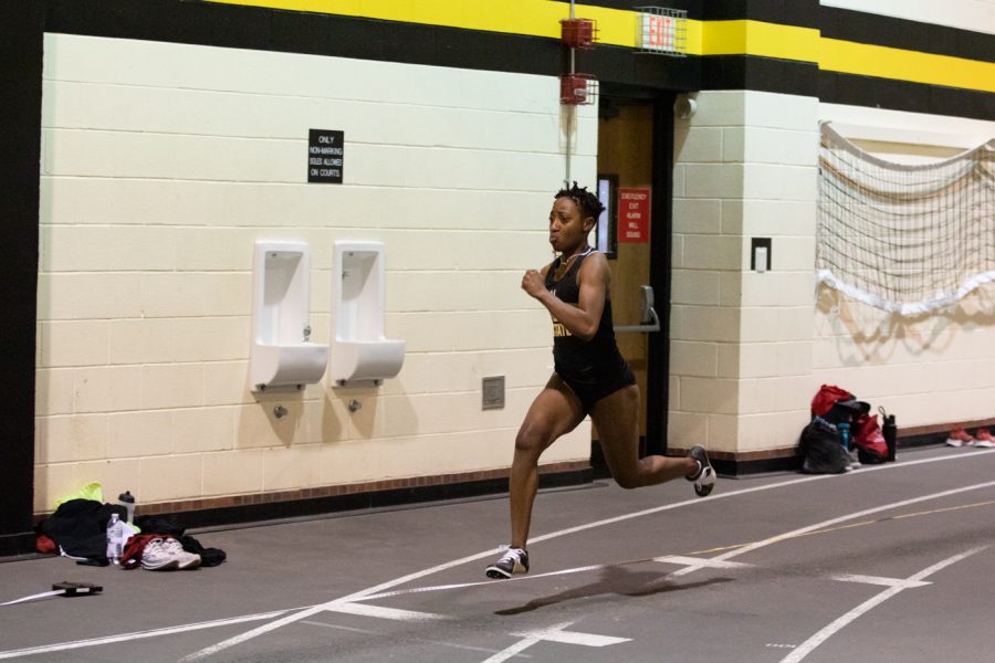 Freshman Jaazar Ridges runs down the lane during her long jump performance on Jan. 13.