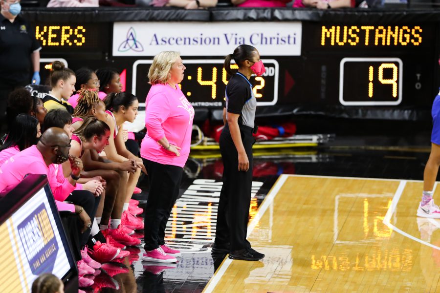 Head coach Keitha Adams looks at the offense during the game against SMU at Charles Koch Arena on Feb. 12.