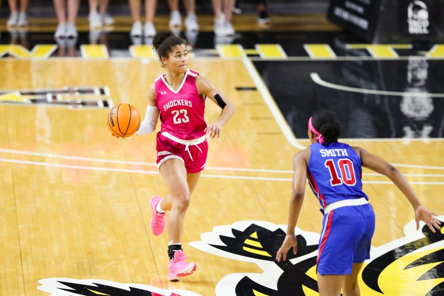 Junior Seraphine Bastin looks to pass during the game against SMU at Charles Koch Arena on Feb. 12.