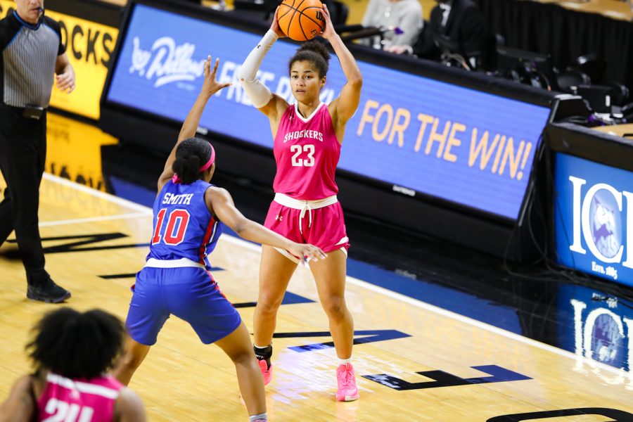 Junior Seraphine Bastin looks to pass during the game against SMU at Charles Koch Arena on Feb. 12.