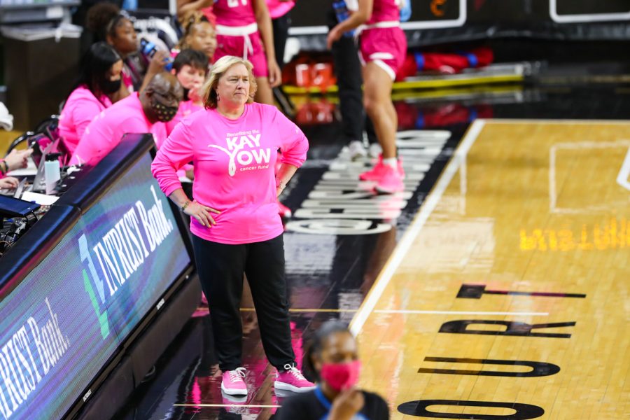 Head coach Keitha Adams looks from the sideline during the game against SMU at Charles Koch Arena on Feb. 12.