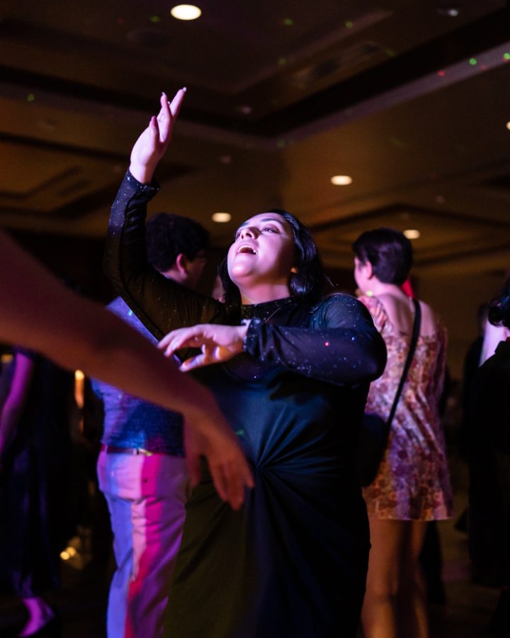 A student dances during Fairmount Formal. The event was hosted by SAC on Feb 19 at the RSC.