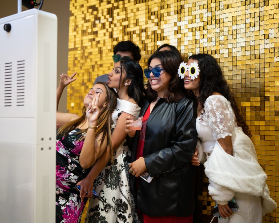 A group of students pose at a photobooth during Fairmount Formal. The event was hosted by SAC on Feb 19 at the RSC.