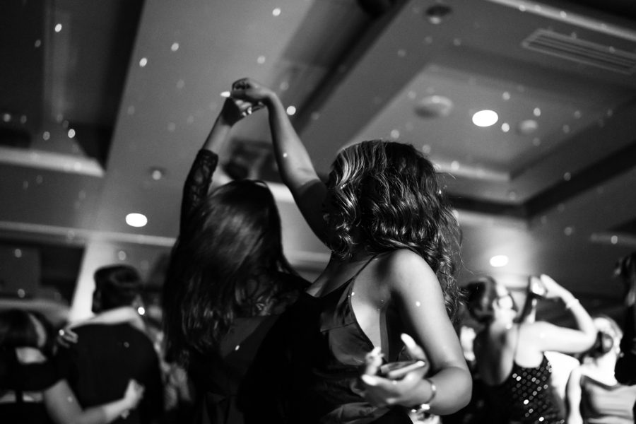 Junior Deborah Jolie (right) and freshman Toyeba Khan (left) dance together during Fairmount Formal. The event was hosted by SAC on Feb 19 at the RSC.