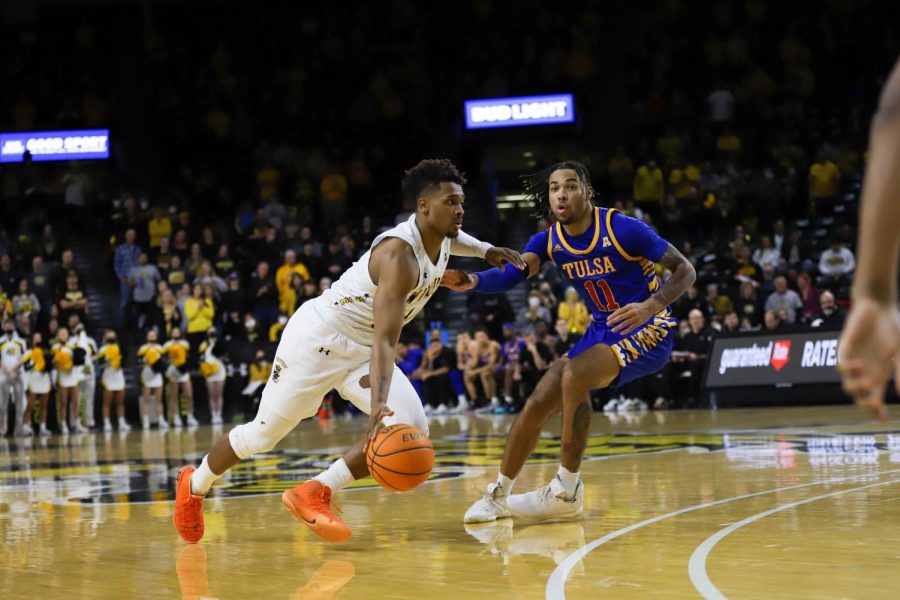 Tyson Etienne drives toward the basket during the game against Tulsa on Feb. 1 inside Charles Koch Arena.