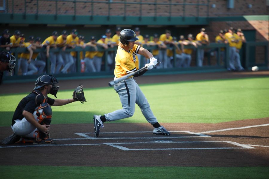 Sophomore Chuck Ingram takes a swing during  a game against Cowley College on Sept. 13 inside Eck Stadium.