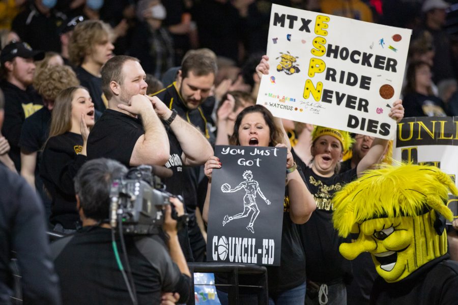 During a time-out, Shocker fans get excited for the cameras.