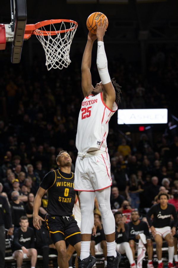 Houston Cougars senior Josh Cartlon dunks on the Wichita State Shockers. Carlton had 23 points, 11 rebounds, and one assist.