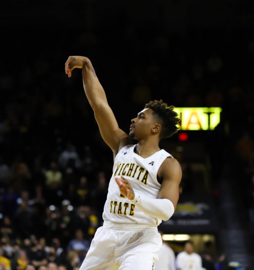 Sophomore Tyson Etienne holds his release during the game against Tulsa on Feb. 1 inside Charles Koch Arena.